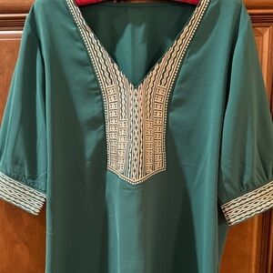 Beautiful green top with detailed embroidery.